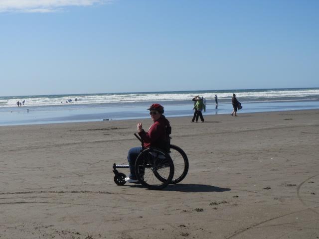 Christina Rae, seen here enjoying the beach, took advantage of GRIT’s payment plan to fund her Freedom Chair