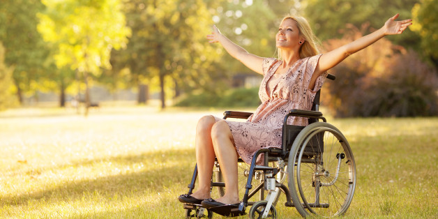 woman-wheelchair-outdoors