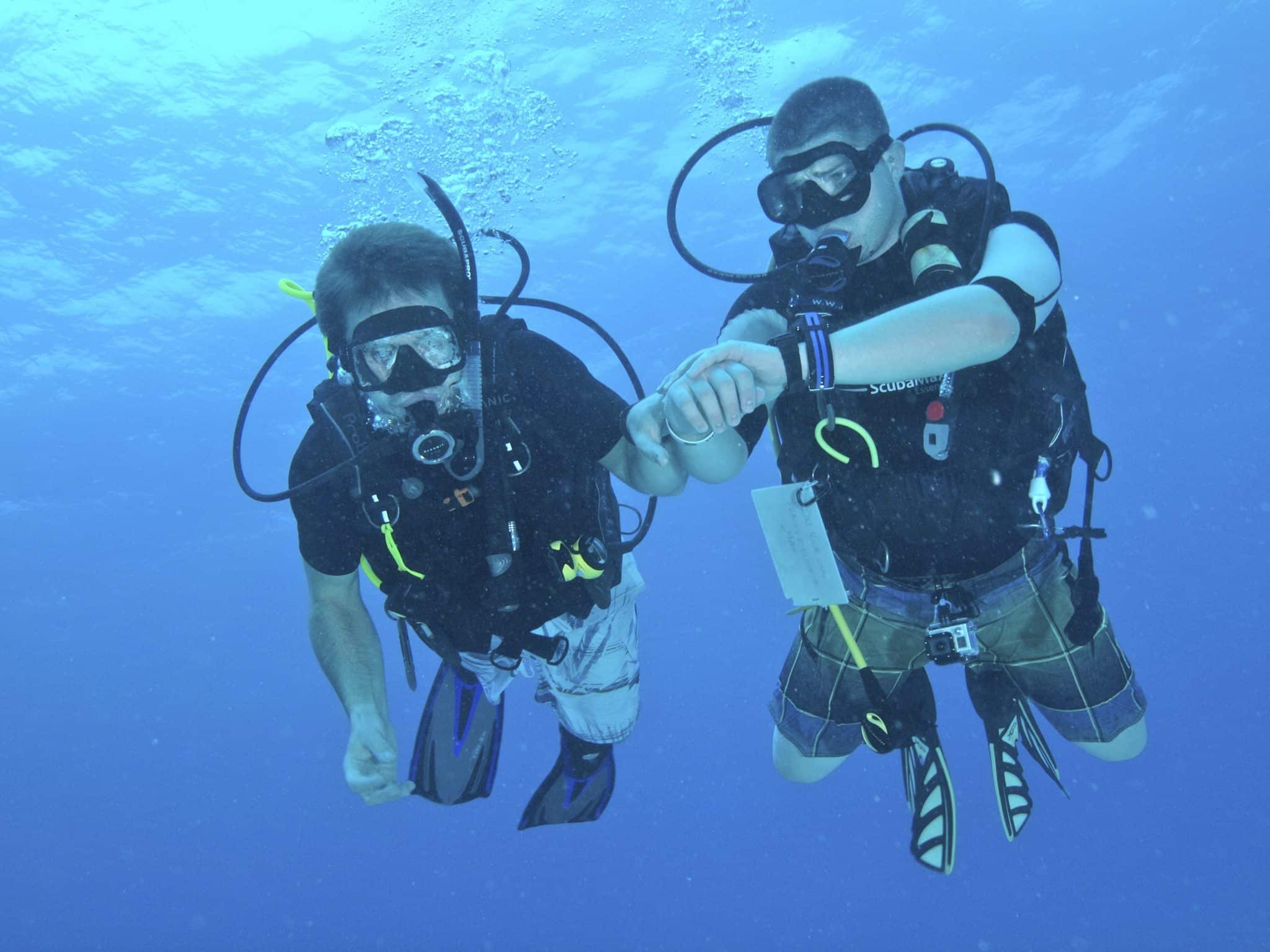 Two divers under water