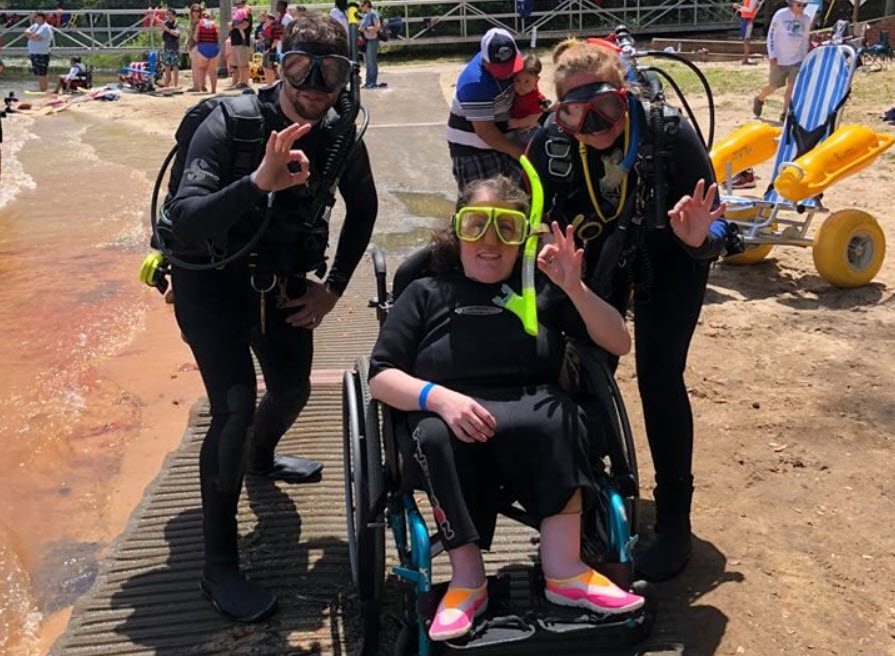 woman in wheelchair in scuba gear