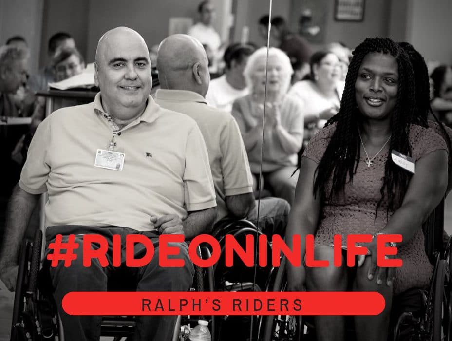 Ray Pizarro and Marcy Lovett sitting in their wheelchairs with their backs to a mirror. #RideOnInLife is in bold red letters.