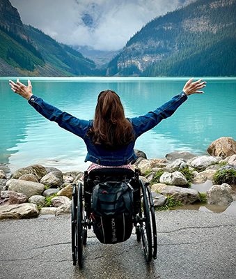 Cheryl beside Lake Louise in Banff, Canada